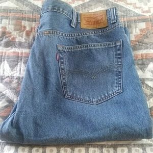 Medium wash men's Levi's jeans.